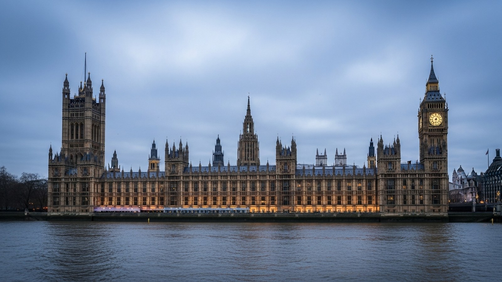 The Palace of Westminster at dusk seen from across the Thames
